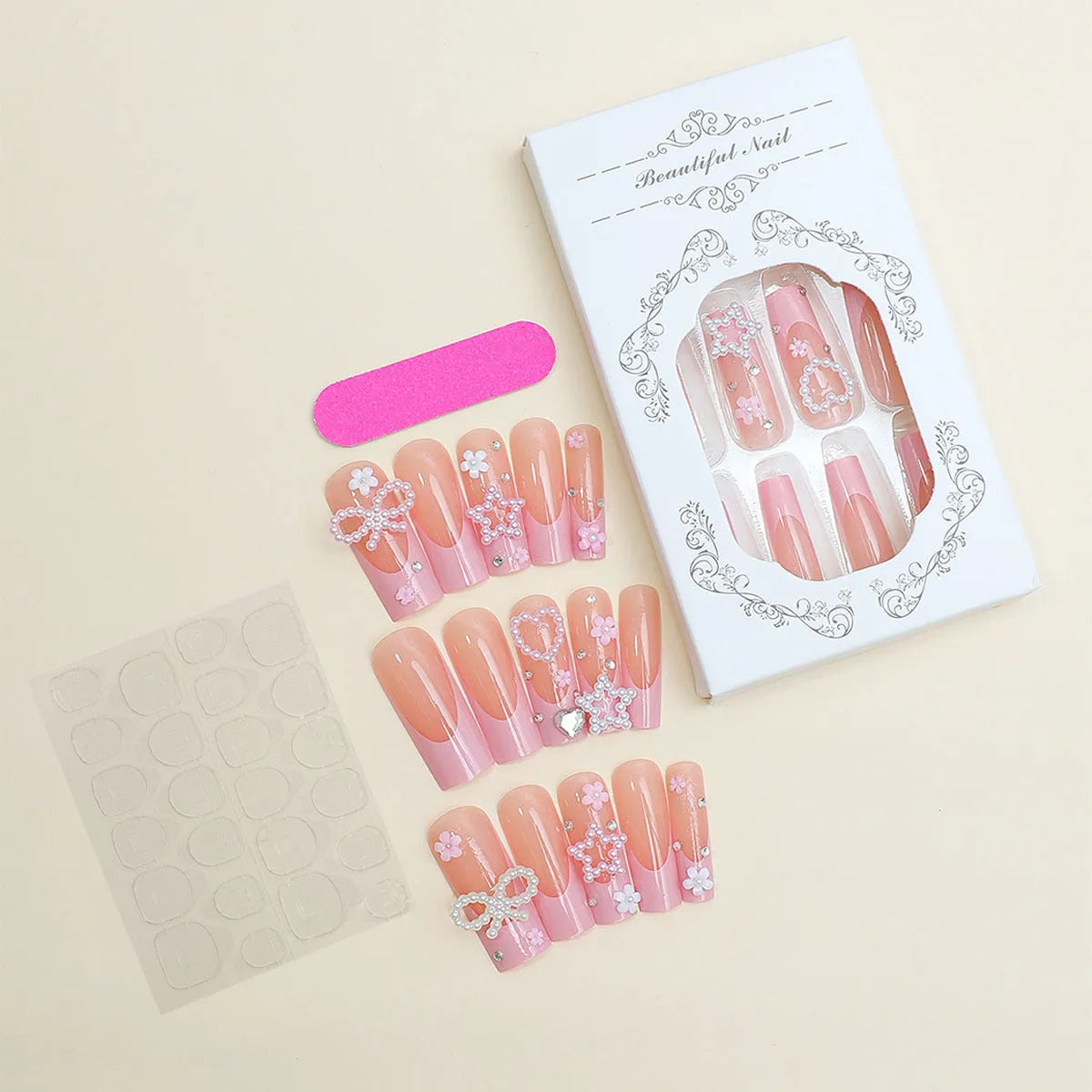 Super long artificial nails with French spot, bow detail, and love pattern in XB-70-48 colour.
