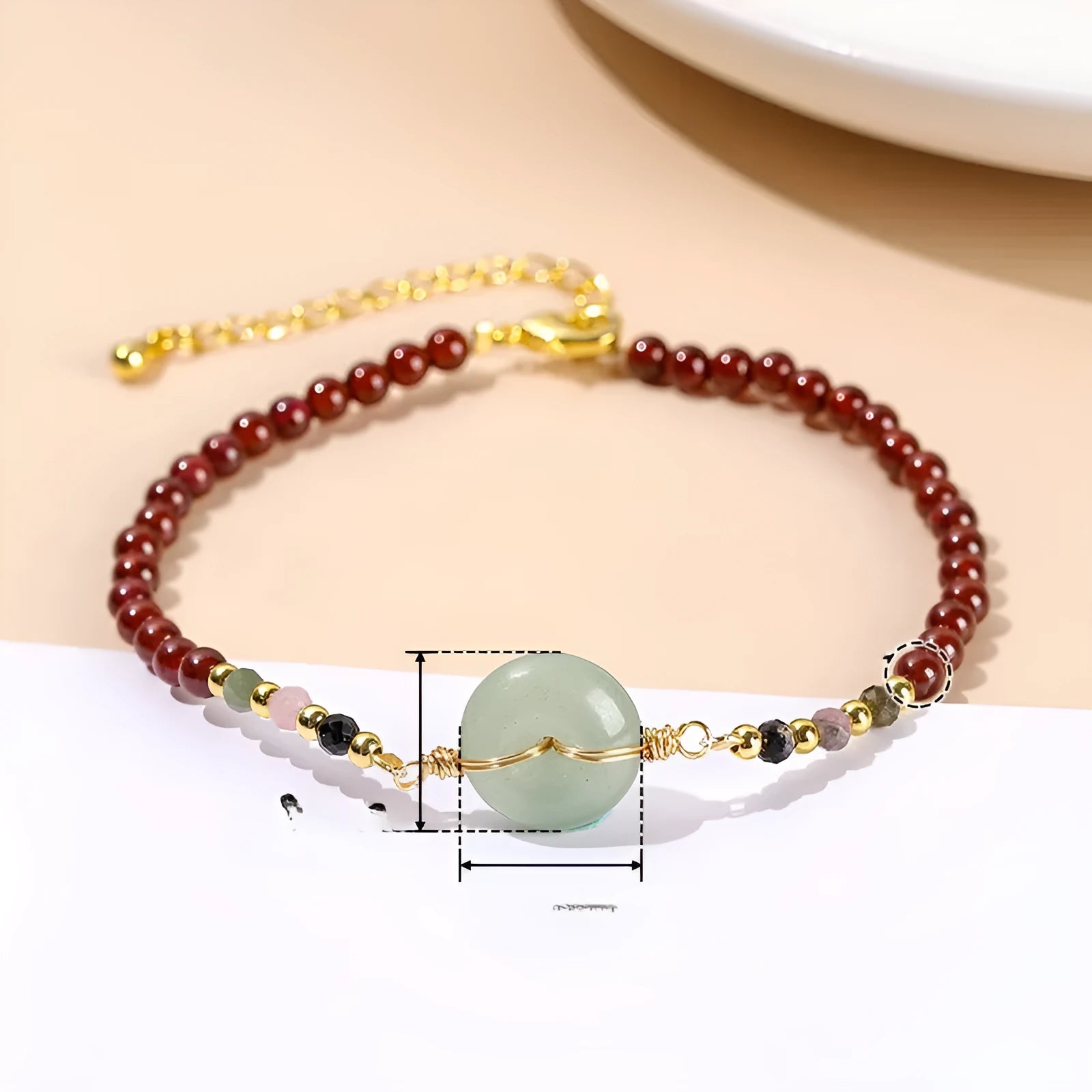 Cute round crystal agate jade bracelet for women with a garnet safety buckle.