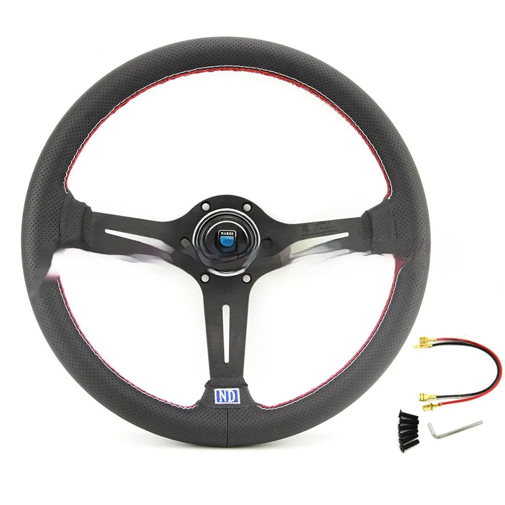 Black leather 14-inch steering wheel with deep middle concave grip and silver three-spoke skeleton.
