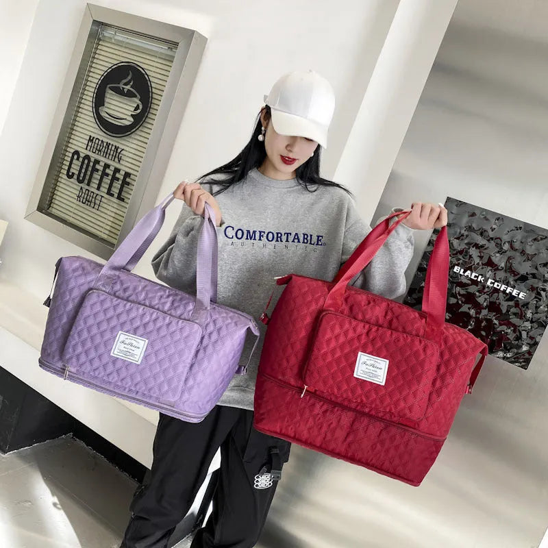 Foldable Oxford cloth travel duffle bag in solid colour with rhombus sewing design and shoulder strap