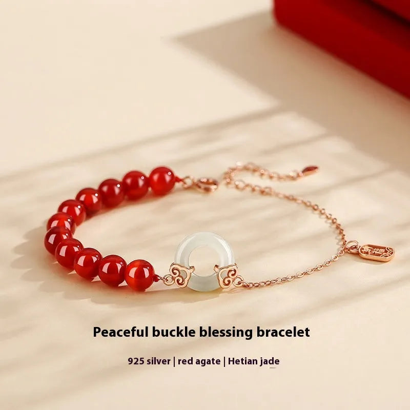 Women's sterling silver 925 bracelet with peace buckle, xiangyun, and fu character charms.