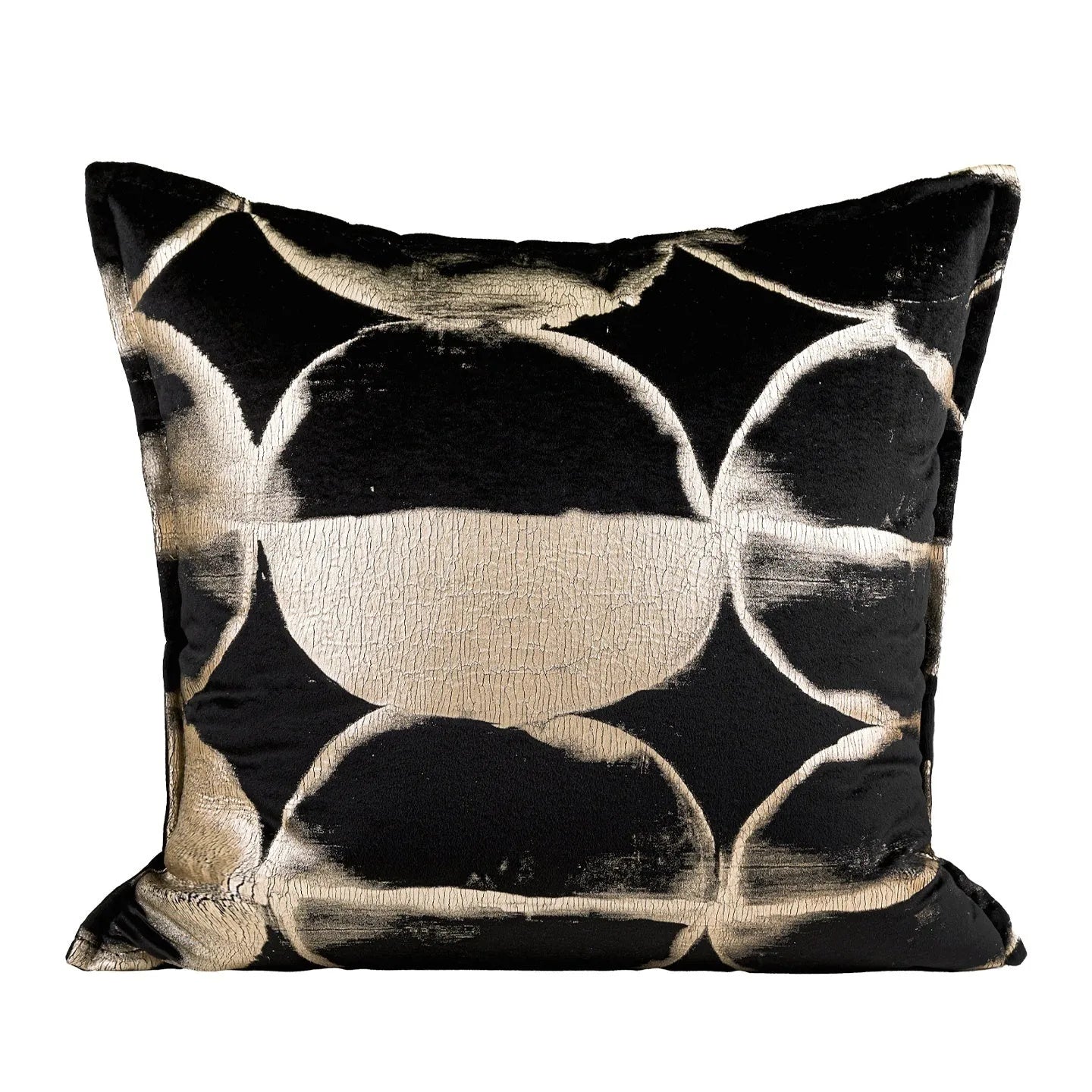 Black and gold abstract pattern flannel pillow cushion on a sofa, shown with removable cover.