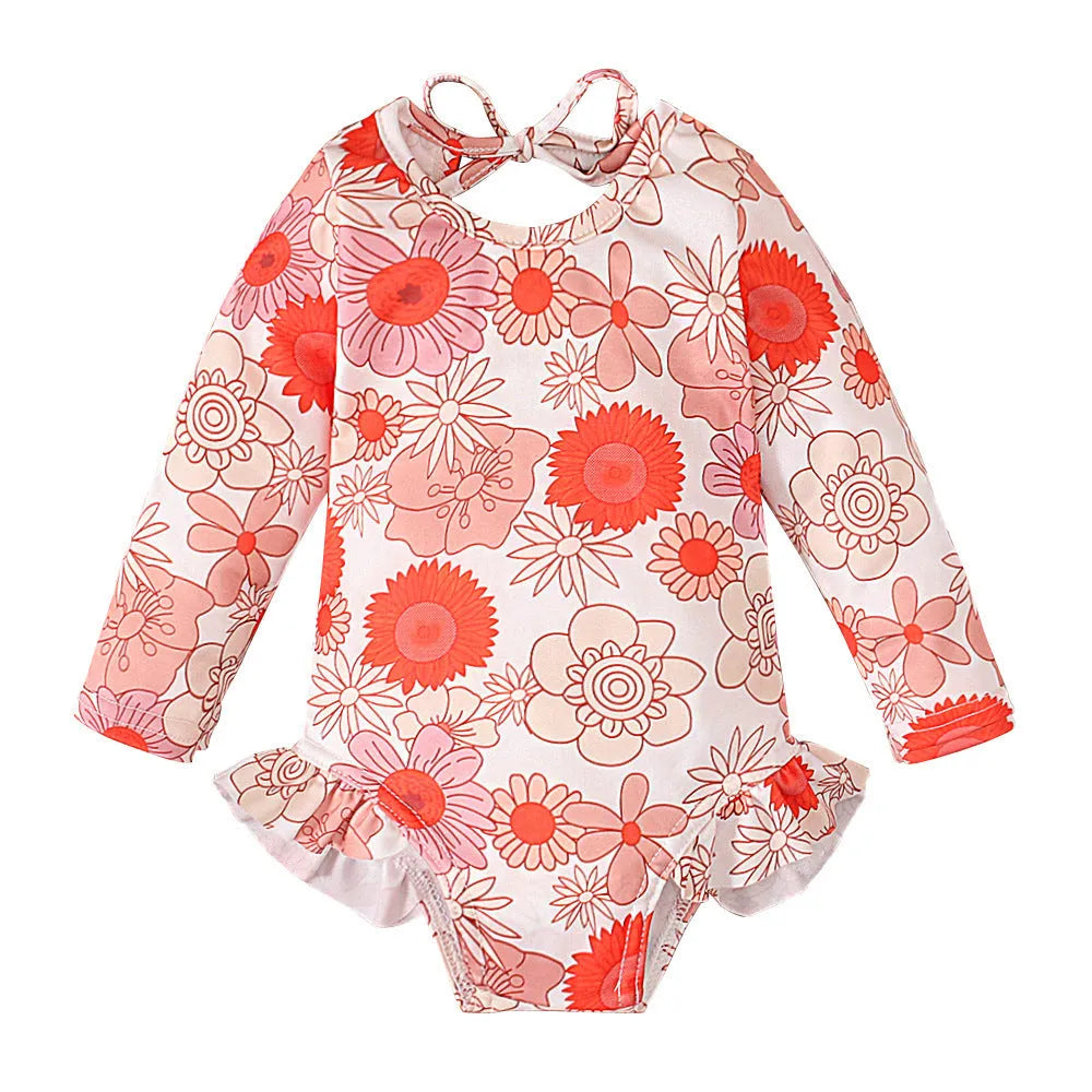 Girl's white floral print open back swimsuit with crew neck design and high-cut briefs