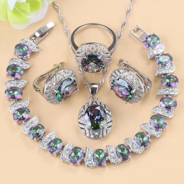 Mixed gem-inlaid copper jewellery set including pendant necklace, earrings, ring, and bracelet in green colour