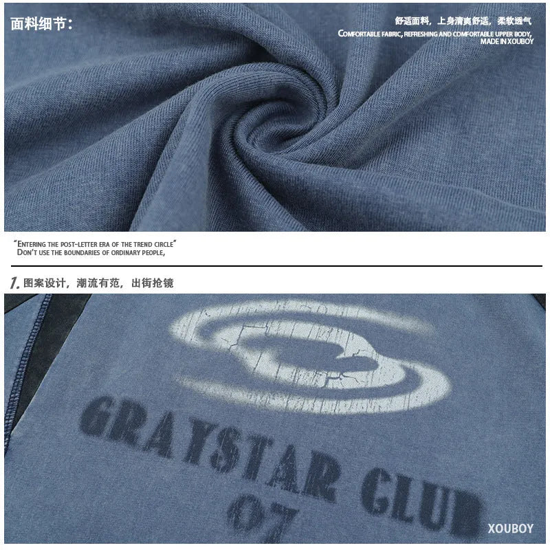 Man's blue hip hop letter print T-shirt with raglan sleeves in a loose fit
