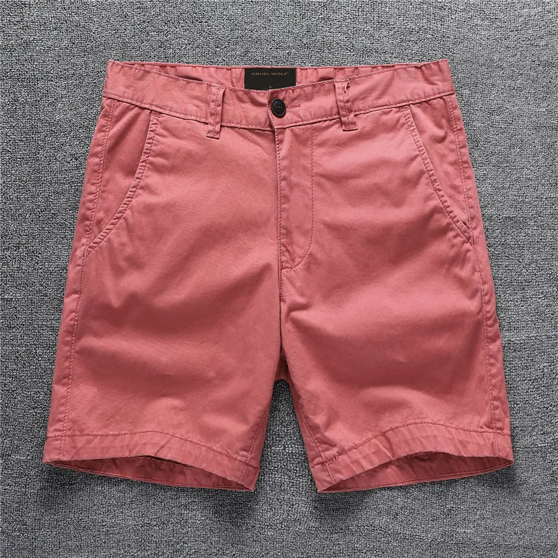 Men's cotton shorts in camouflage green with a zip fly and mid-rise waistband.