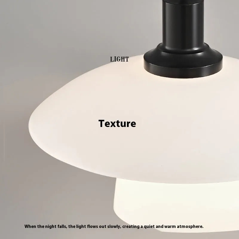 Minimalist black bedside pendant lamp with glass shade and three-colour light fitting