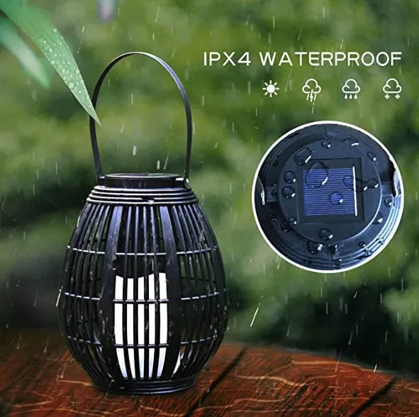 Oval solar garden light with rattan wind lamp design measuring 180x180x230mm