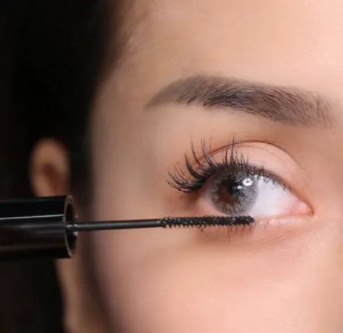 Waterproof mascara in natural black with a wand for curling and lengthening lashes