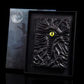 Demon Eye Cthulhu notebook with embossed resin relief cover on dark kraft paper