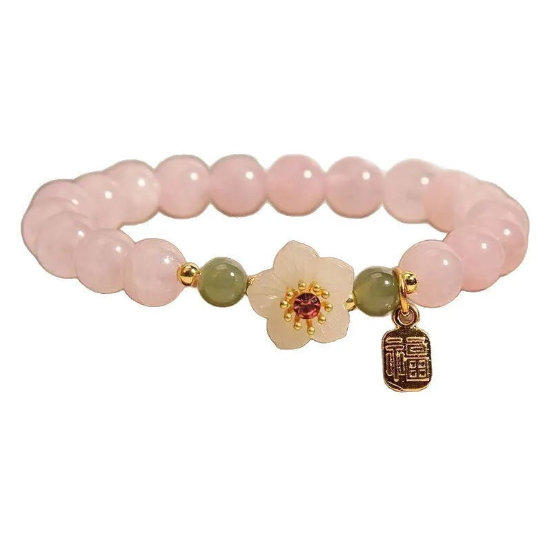 Crystal Hetian jade bracelet with peach blossom beads and camellia floral elements in pastoral national style design