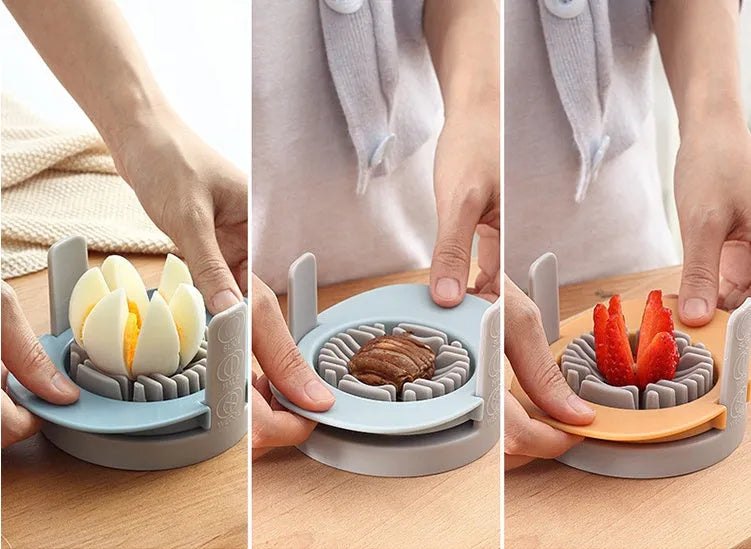 Manual three-in-one egg cutter in blue, orange and red with stainless steel blades and stackable design