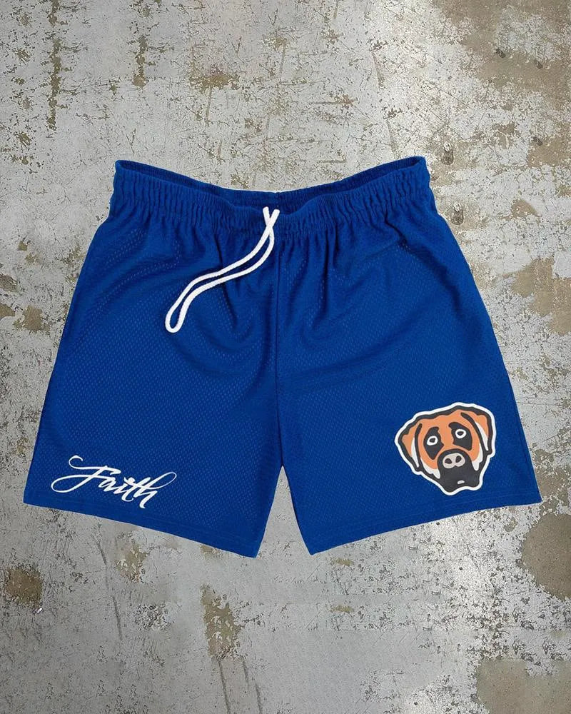 Man wearing loose blue digital print beach shorts made from quick-dry milk silk polyester fabric.