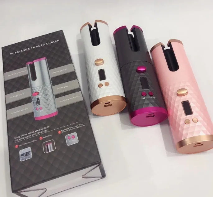 White portable USB charging mini curling iron with gold ceramic barrel on a table.