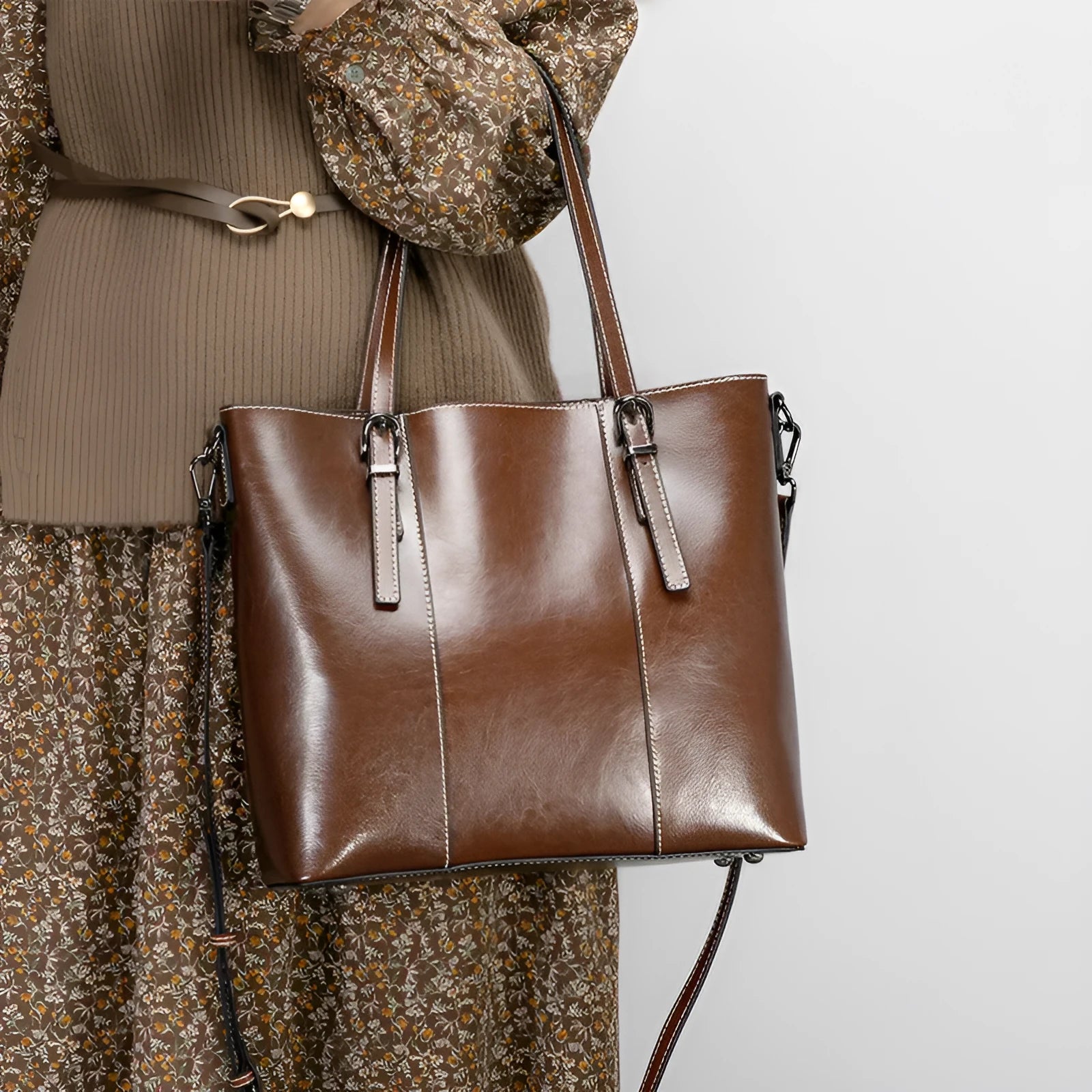 Brown genuine leather women's shoulder bag with retro styling and multiple organisational compartments