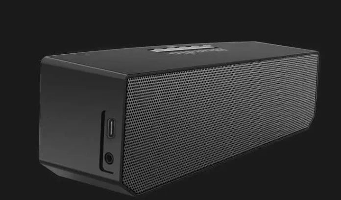 Black BS-6 cloud smart speaker showing front grill and compact rectangular body.