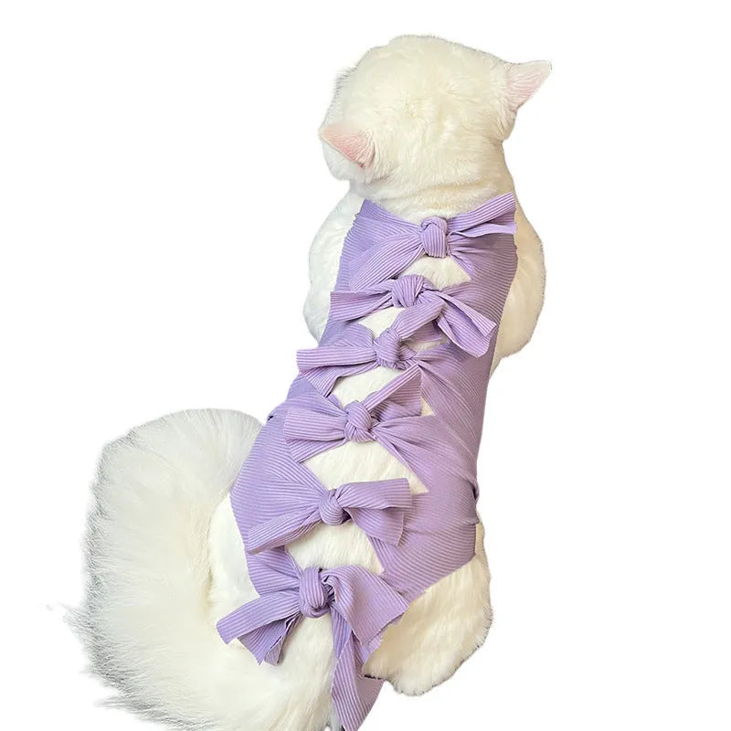 Lace-up cat recovery suit in blue, shown on a cat, featuring a full-body wrap design and adjustable back lacing.