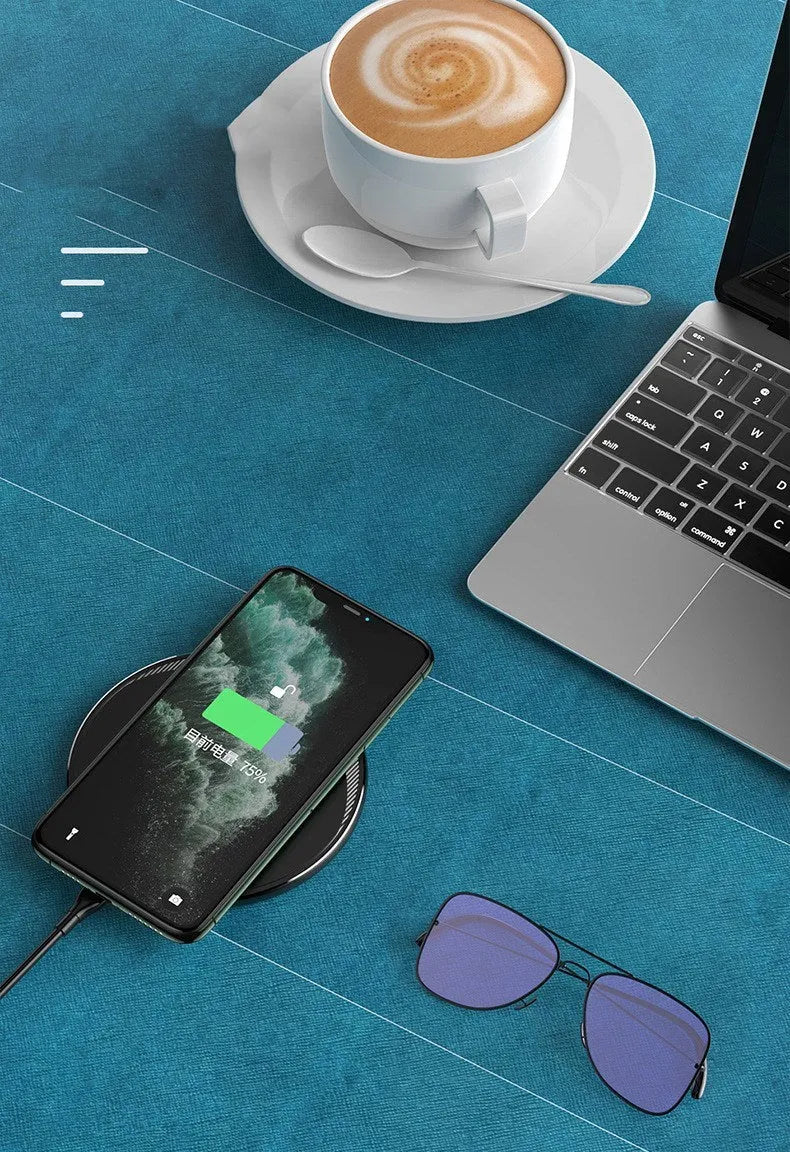 Black circular Kuulaa KL-CD16 wireless disc charger for mobile phones with LED indicator
