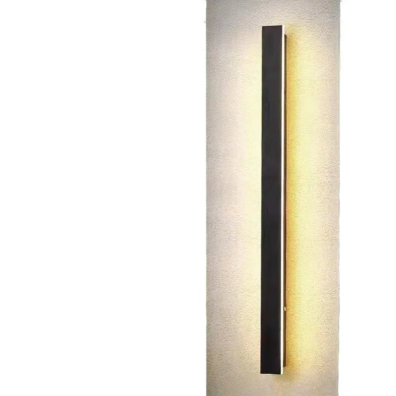 Outdoor waterproof LED wall lamp with linear design and IP65 rating on a wall.