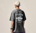 Man wearing a black loose-fit short-sleeved t-shirt, plus size casual summer top.