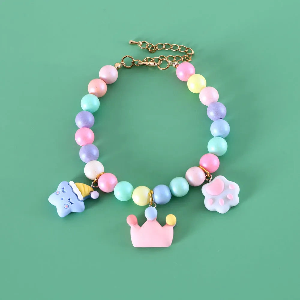 Colourful resin pet collar and bracelet set with moon and rabbit charms in macaron colours.