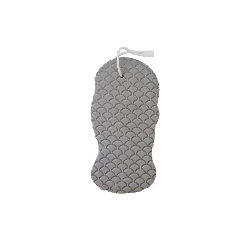 White 3D fish scale pattern bath sponge ball for gentle body exfoliation in the shower.