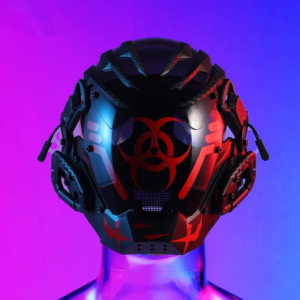 Black angular full-face tech helmet mask on a white background, showing sculpted details.