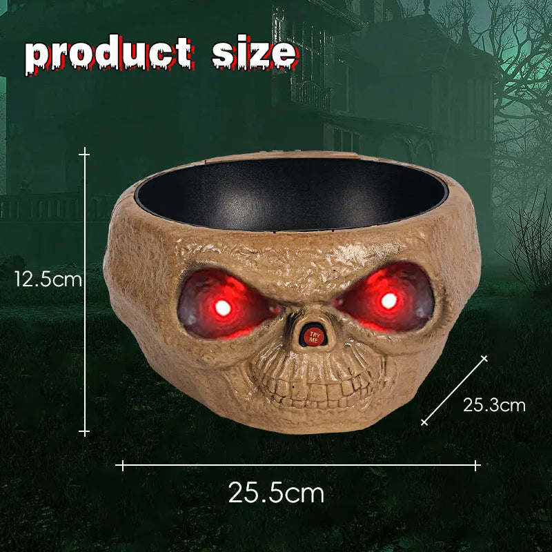Motion activated Halloween candy bowl plastic pumpkin shape with skeleton hand and glowing red eyes