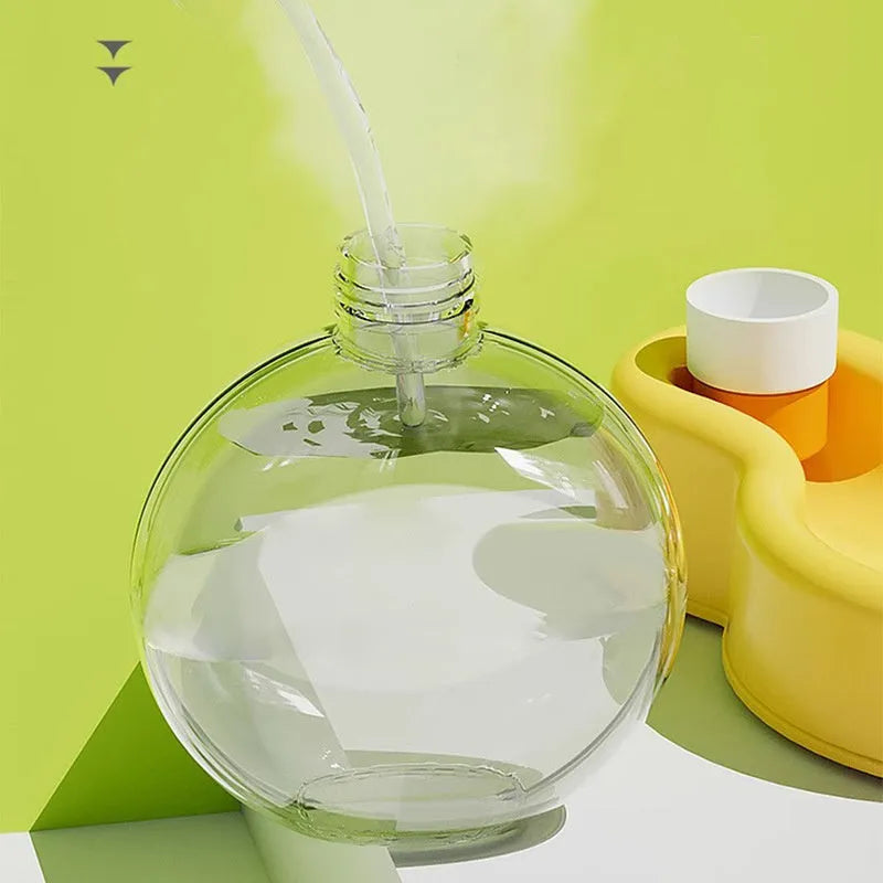 Green portable dog travel water cup with pull-out bowl, showing 500ml capacity and leak-proof design.
