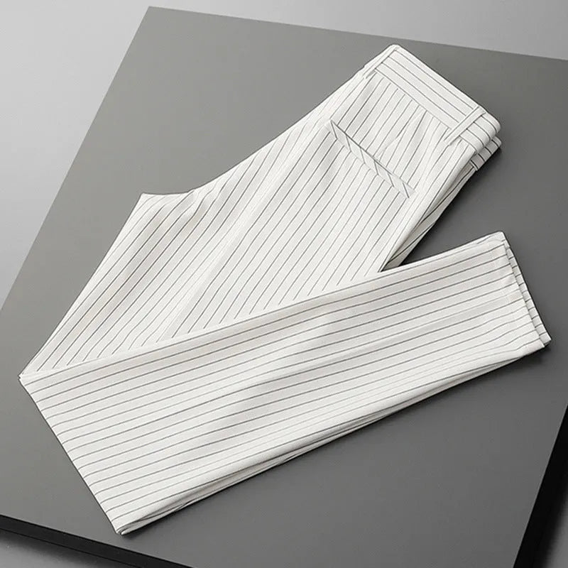 Men's loose striped suit trousers in black and white, available in both full-length and crop jeans styles