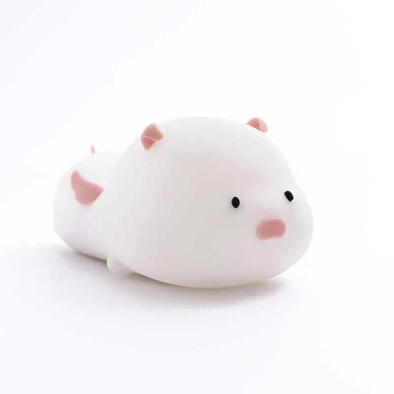Blue silicone pig night light with sleeping expression and rechargeable battery