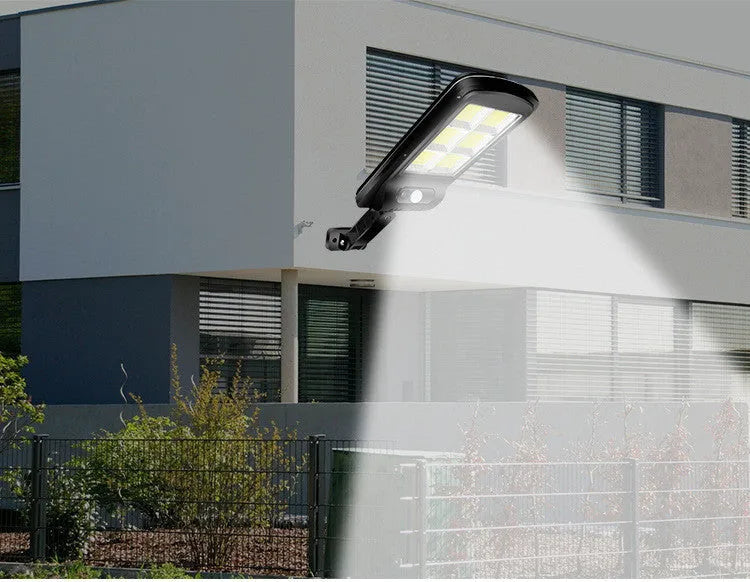 Black outdoor solar motion sensor light with solar panel and IP65 weatherproof rating