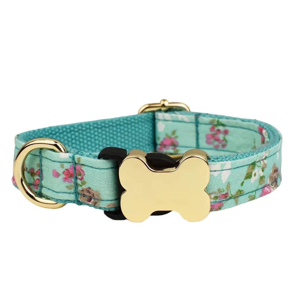 Nylon dog collar with a printed grid pattern and a large bone-shaped metal buckle.