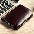 Men's black full-grain leather bifold wallet open, showing eight card slots and a zipped coin pocket.