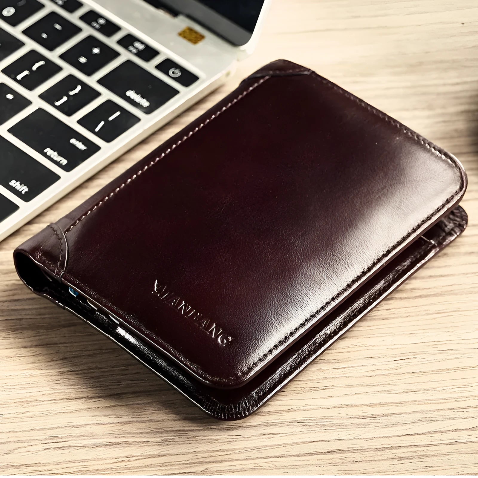 Men's black full-grain leather bifold wallet open, showing eight card slots and a zipped coin pocket.