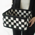 Grey checkerboard woven felt storage basket with folding design