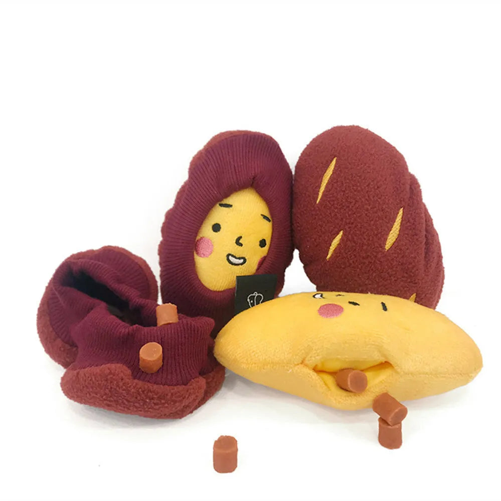 Red sweet potato pet toy with peelable exterior revealing hidden food pocket for treat dispensing