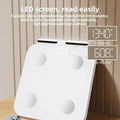 White professional 8-electrode smart body fat scale with tempered glass platform and LED display.