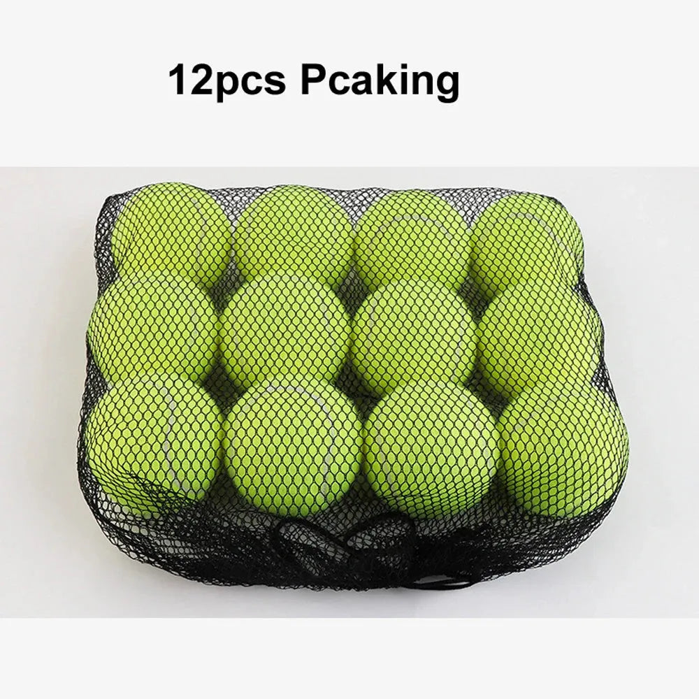 Bright pink, blue, yellow, green, and orange 6.3cm rubber tennis balls for dogs on grass.