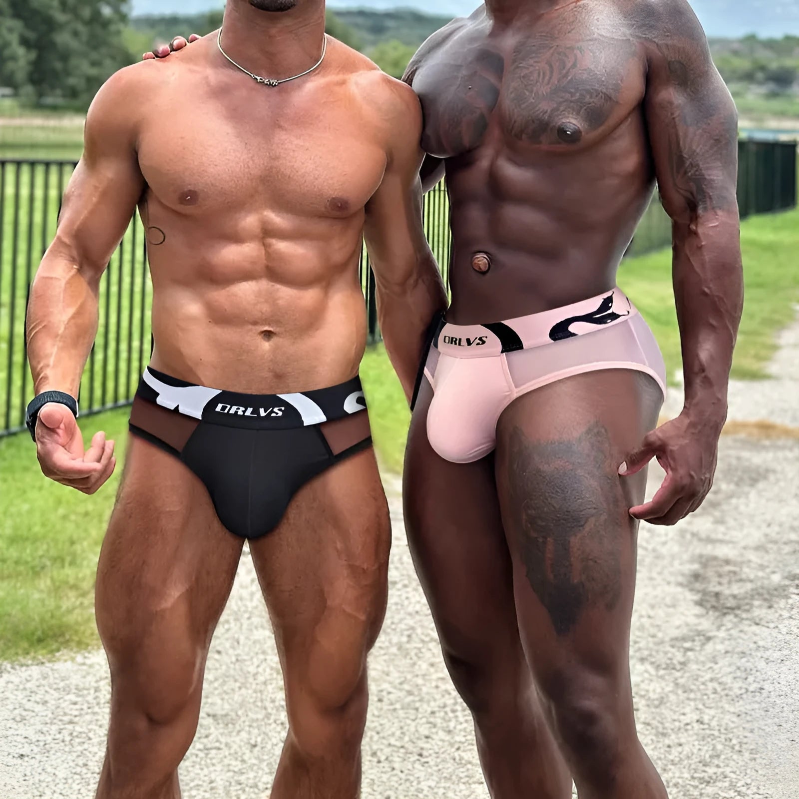 Men's solid colour modal boxer shorts in black, pink, and red with low waist design