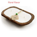 Lavender-scented soy wax candle in a wooden basin with a wooden wick