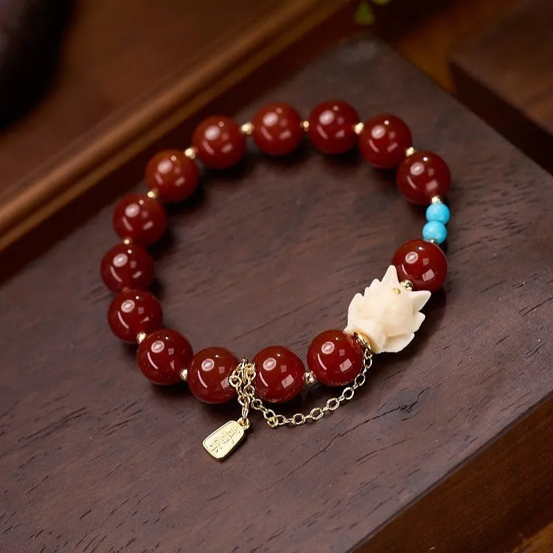 Red agate and ivory nut bracelet with 10mm beads and Fengjiu design in retro style