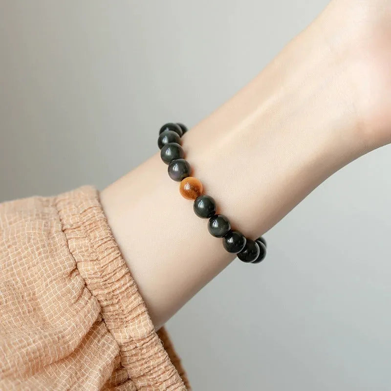 Korean-style geometric obsidian bracelet with natural eye pattern stones