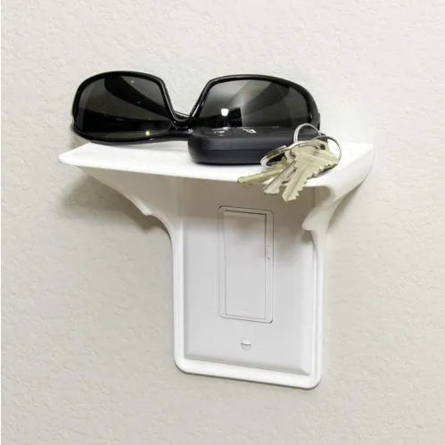 White plastic socket tool storage rack mounted on a wall, dimensions 14cm by 10cm by 15cm.