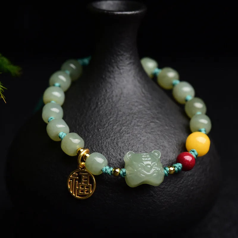 Natural Hetian jade bracelet with cinnabar beeswax beads and animal zodiac modelling