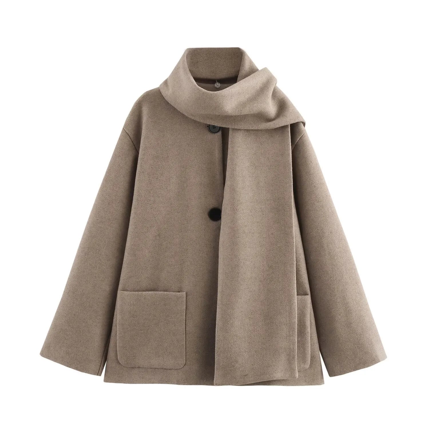 Women's long black coat with a grey artificial fur collar and side pockets, shown in a street fashion setting.