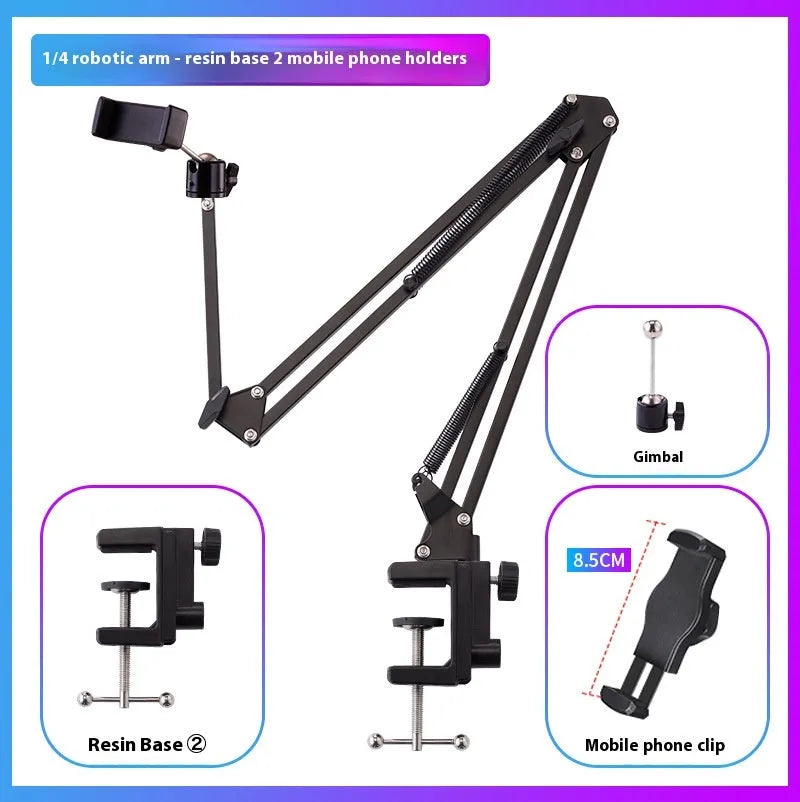 Black foldable metal desktop cantilever bracket holding a tablet, showing its adjustable arm and clip.