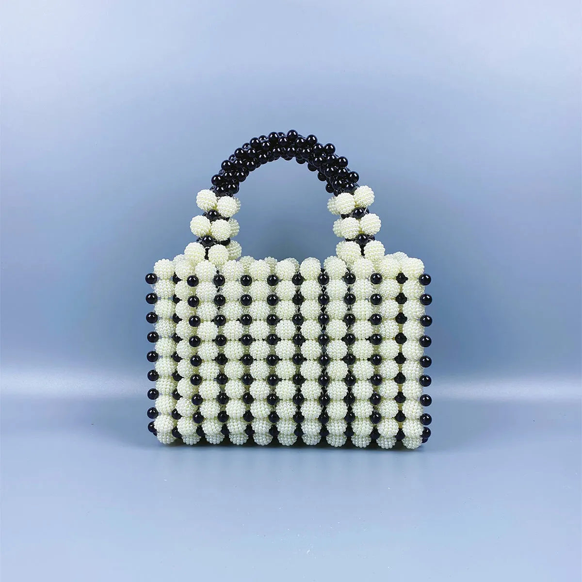 Hand-woven acrylic beaded square bag in vertical shape with seven colour options for daily matching