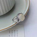 Adjustable vintage copper ring with white chalcedony colour and U-shaped open design
