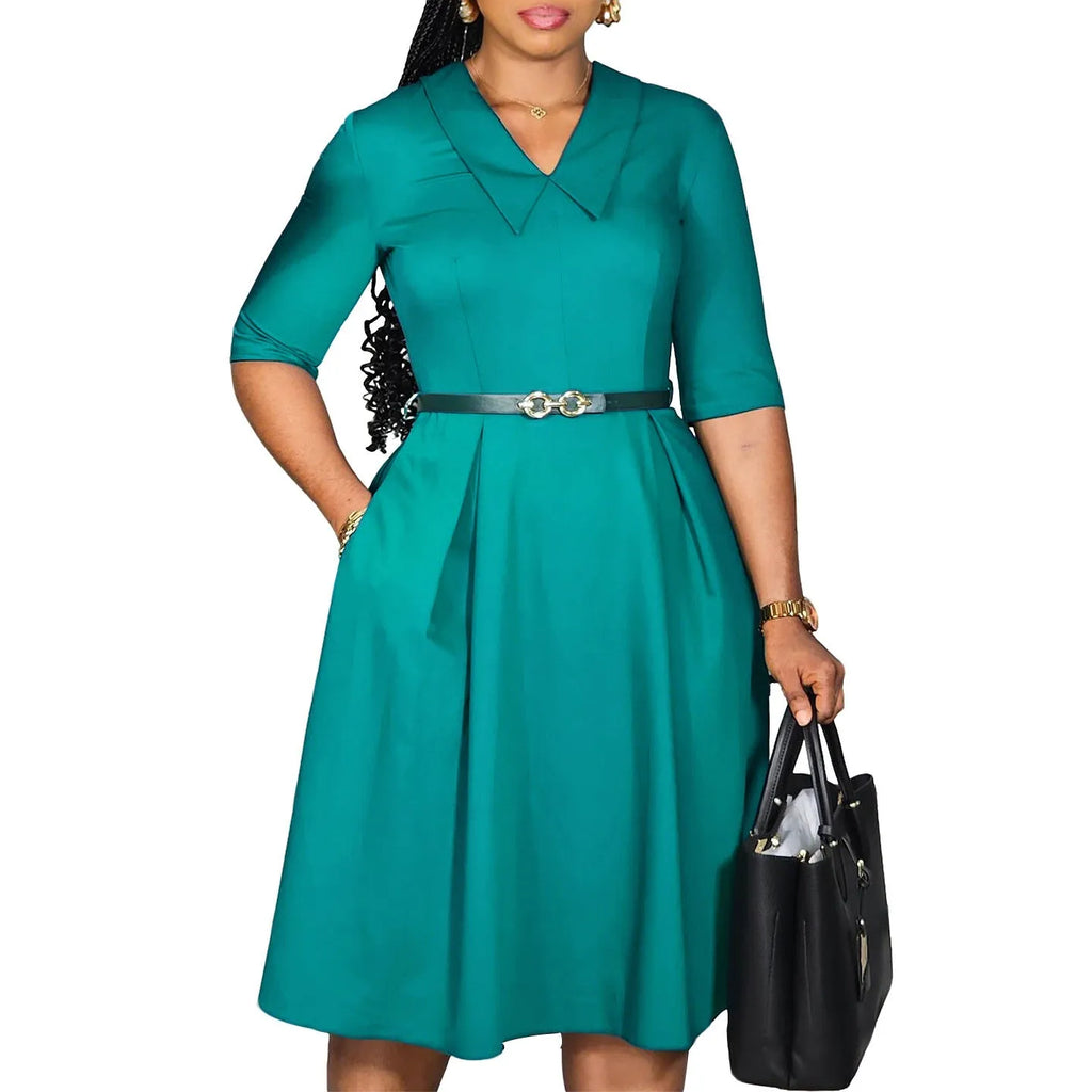 Green high waist African dress with matching belt and half sleeves on mannequin